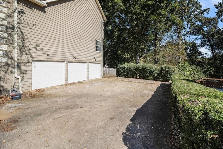 Property Photo: 9216 Saddlebrook Way GA 30135