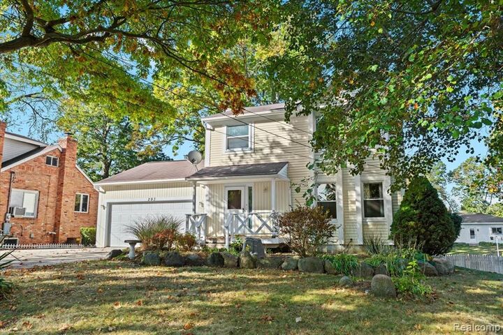 Property Photo:  293 Clairemont Drive  MI 48362 3617