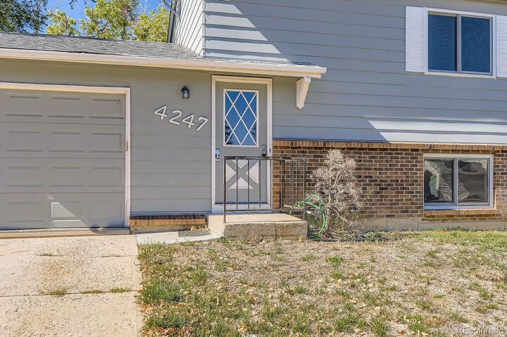 Property Photo: 4247 S Pitkin Street CO 80013