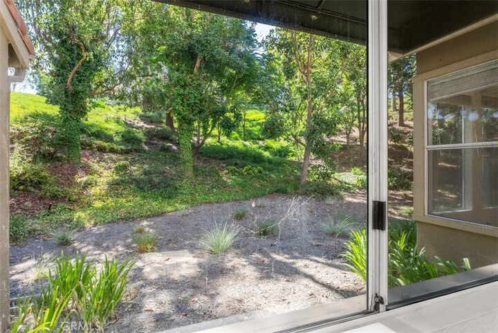 Property Photo:  23 Caribbean Ct. # 216  CA 92677