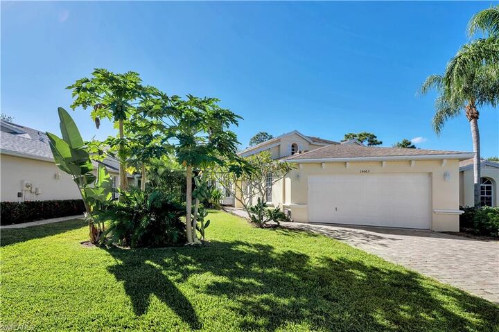 Property Photo: 15063 Sterling Oaks Dr FL 34110