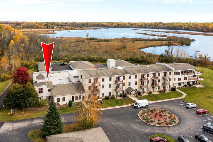 Property Photo:  9900 Hudson Boulevard 104  MN 55808 