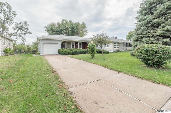 Property Photo: 2827 S 38th Street NE 68105