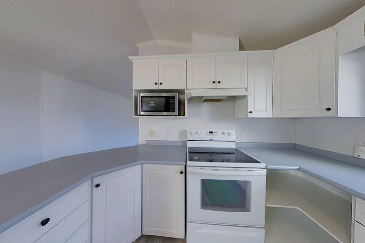 Property Photo:  812 6 Avenue SW 20  AB T0G 2A0 