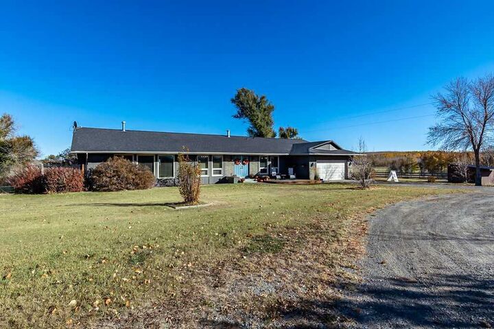 Property Photo: 434256 24 Street W AB T1S 1A1