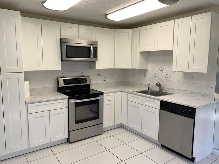 Property Photo:  4958 Alder Drive A  FL 33417 
