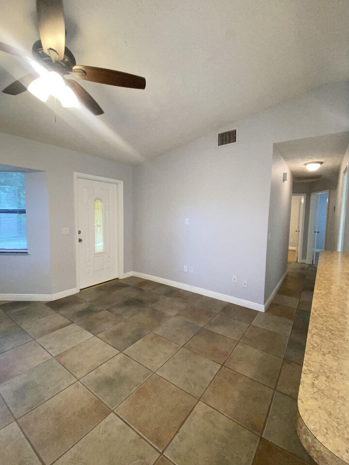 Property Photo: 1932 SW Capri Street FL 34953