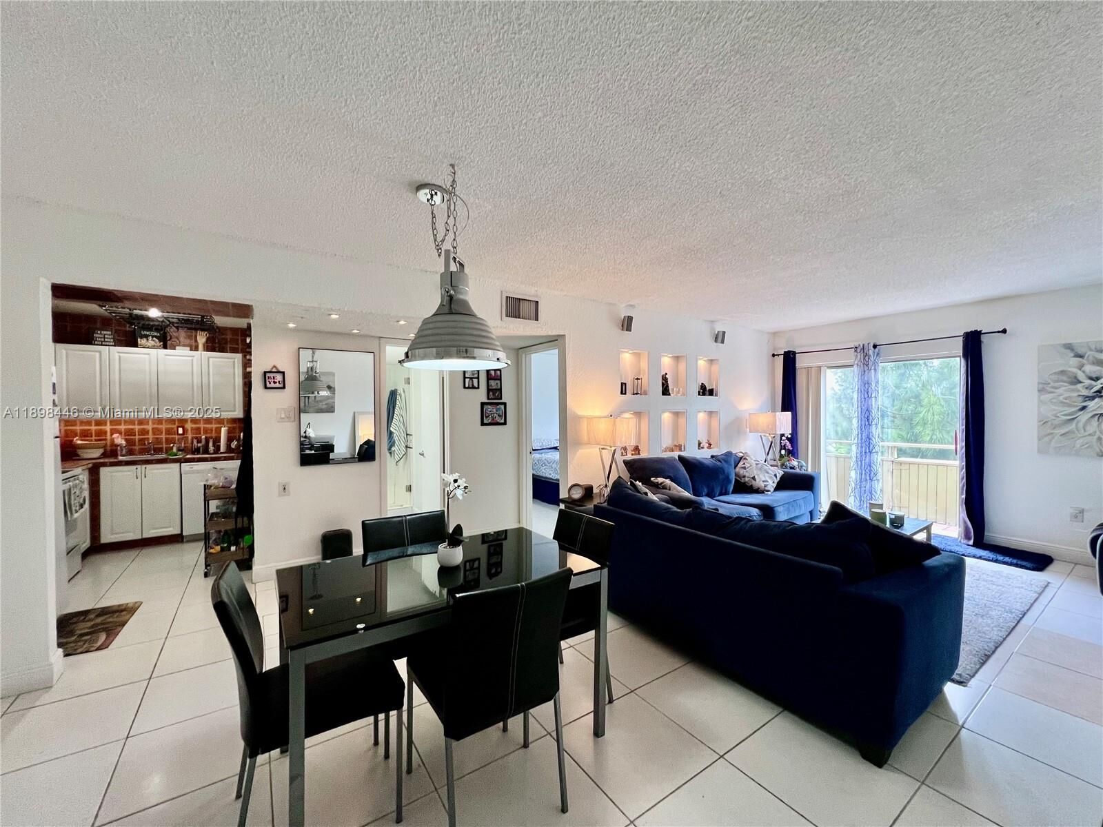 Property Photo: 17530 NW 68th Ave C4008 FL 33015