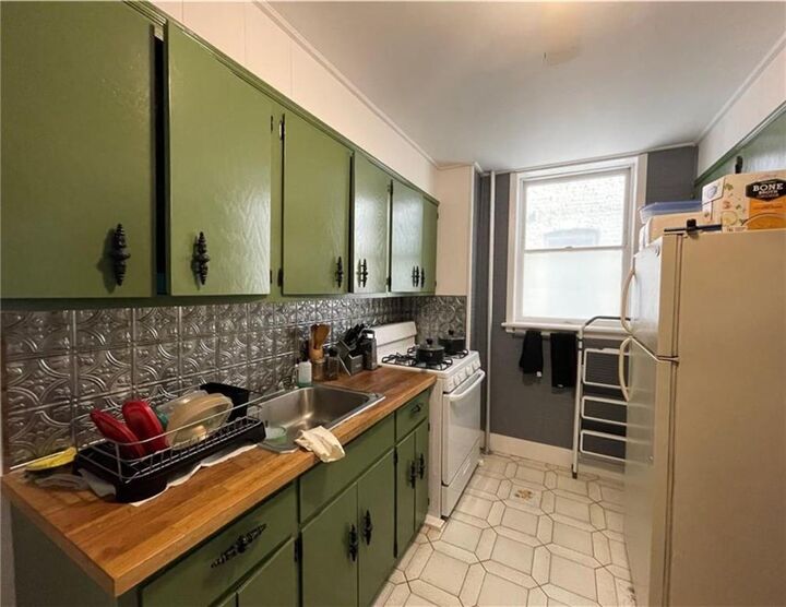 Property Photo:  1424 71st Street  NY 11228 