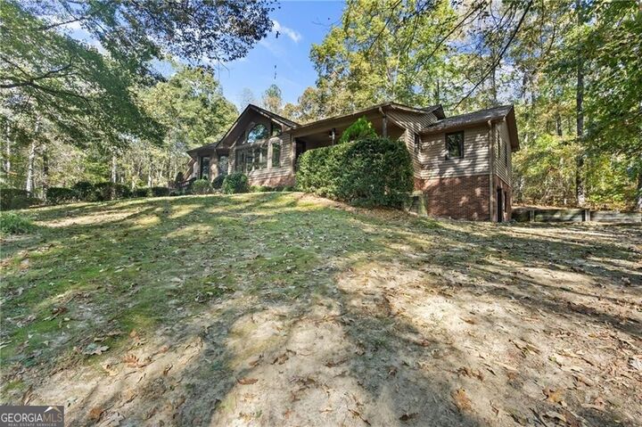Property Photo:  6985 Spout Springs Road  GA 30542 
