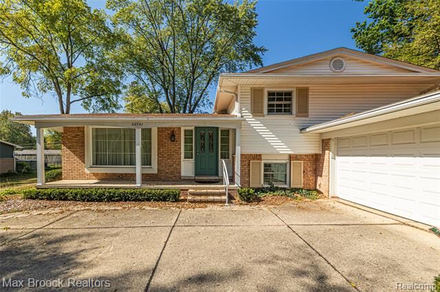 Property Photo:  23751 Gill Road  MI 48335 