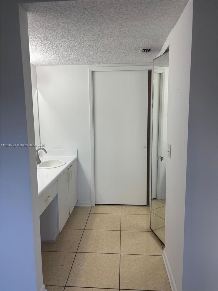 Property Photo:  1601 SW 128th Ter 111A  FL 33027