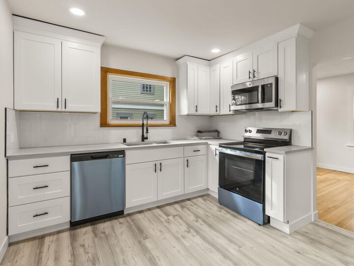 Property Photo:  6212 N 106th St  WI 53225 