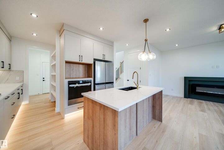 Property Photo: 20 Blackbird Bend AB T8L 0G6