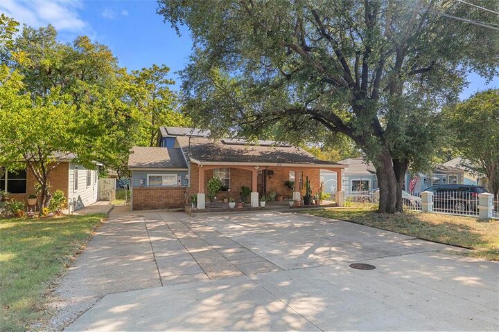 Property Photo:  518 Red Bud Lane  TX 75211 