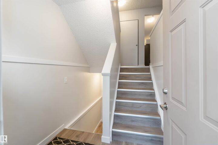 Property Photo:  10406B 28A Avenue NW  AB T6J 4J6 