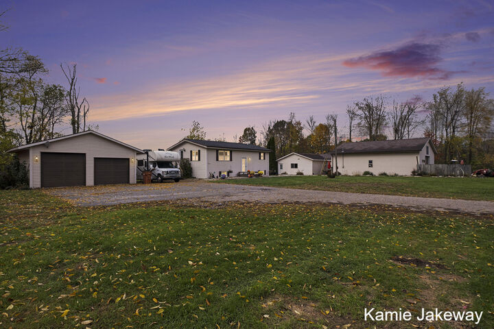 Property Photo:  8395 McArthur Avenue NE  MI 48809 