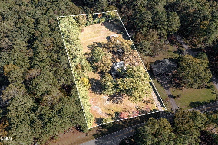 Property Photo:  5033 Theys Road  NC 27606 