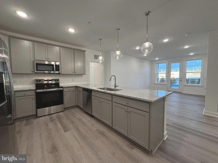 Property Photo:  21731 Dovekie Terrace #304  VA 20147 