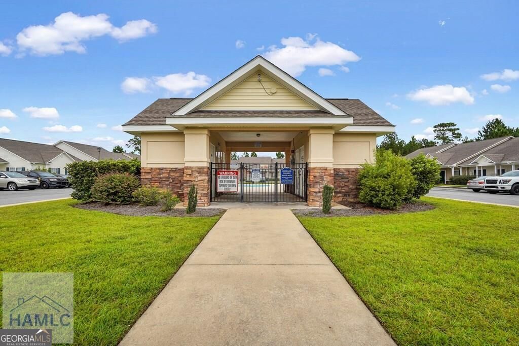 Property Photo:  401 Barry McCaffrey Boulevard K2  GA 31313