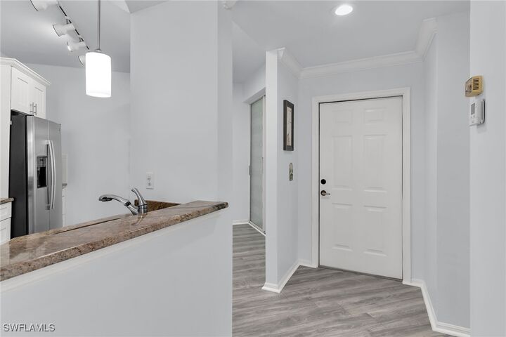 Property Photo:  1000 Mainsail Drive S 112  FL 34114 