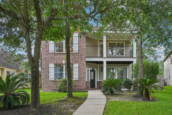 Property Photo: 90 Panterra Way TX 77382