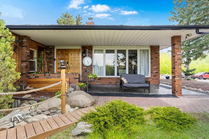 Property Photo: 24157 Meadow Drive AB T3R 1A8