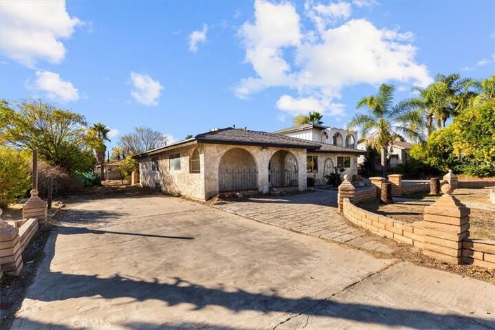 Property Photo:  10594 Spruce  CA 92316 