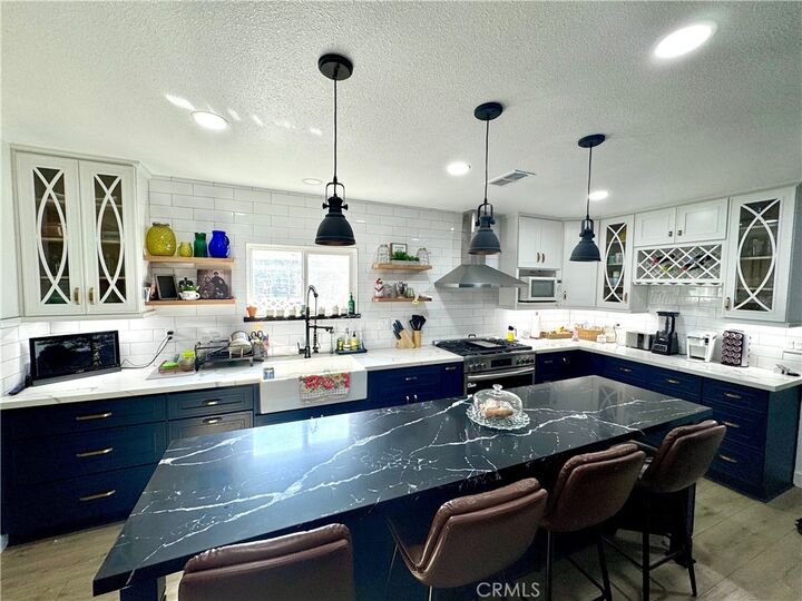 Property Photo:  7040 Barton  CA 92404 