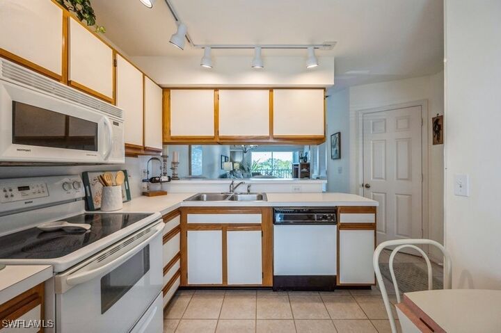 Property Photo: 1325 Mainsail Drive 1213 FL 34114