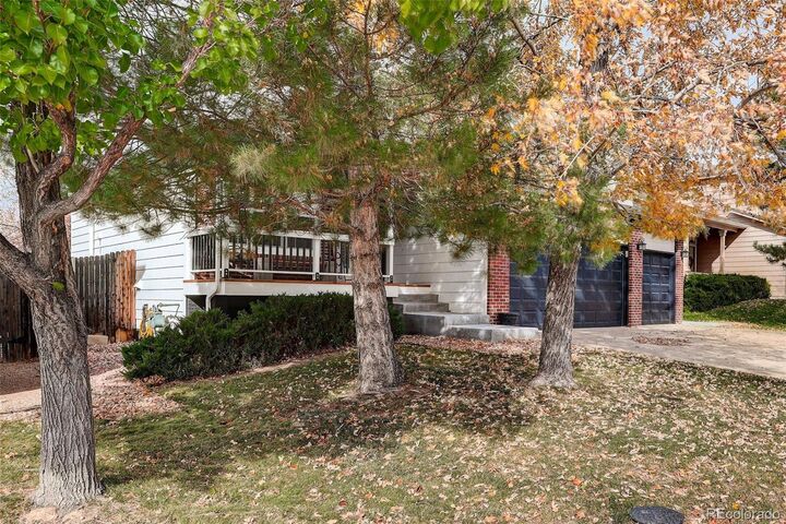 Property Photo: 5491 S Versailles Street CO 80015