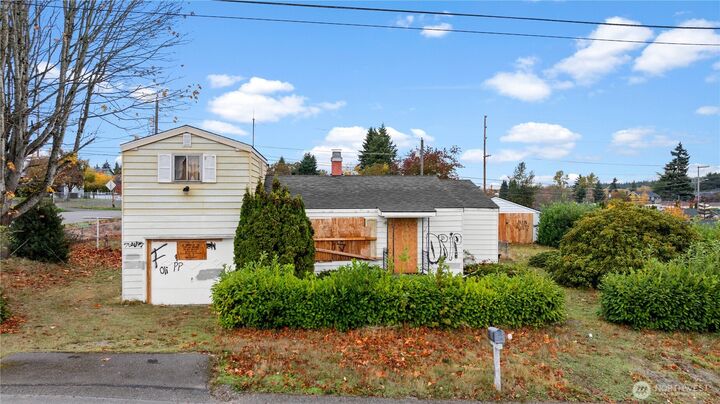 Property Photo:  1205 E 65th Street  WA 98404 