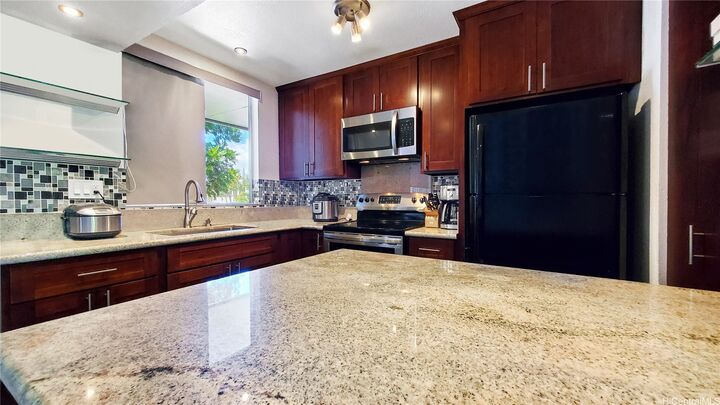 Property Photo: 95-644 Hanile Street E202 HI 96789