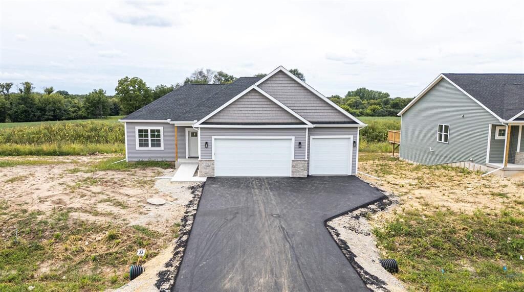 Property Photo:  201 Edgewater Ct  WI 53091 