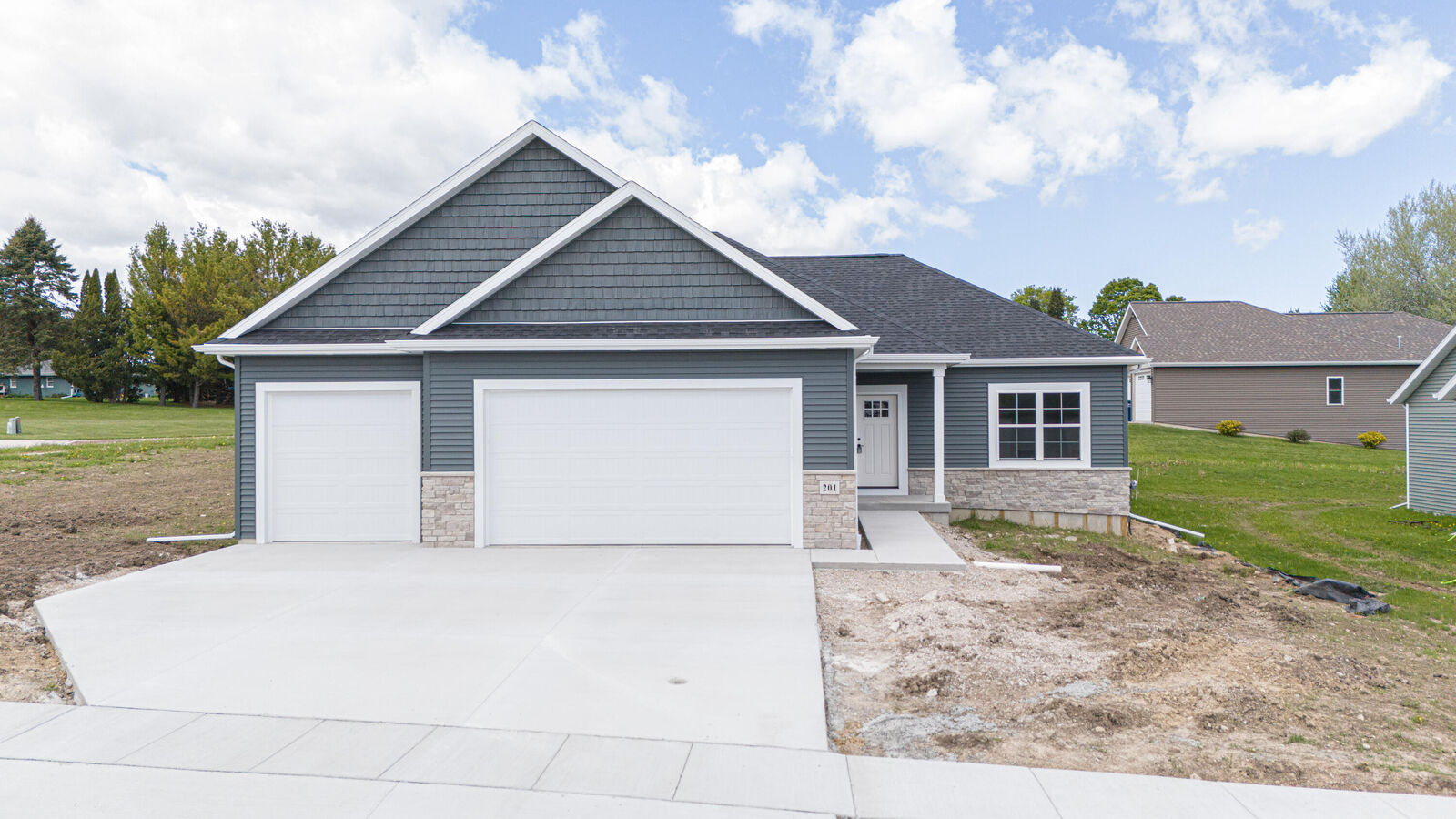 Property Photo:  201 Edgewater Ct  WI 53091 