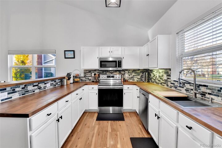 Property Photo: 15555 E 40th Avenue 73 CO 80239