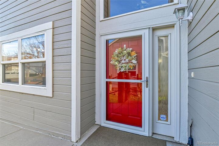 Property Photo: 15555 E 40th Avenue 73 CO 80239