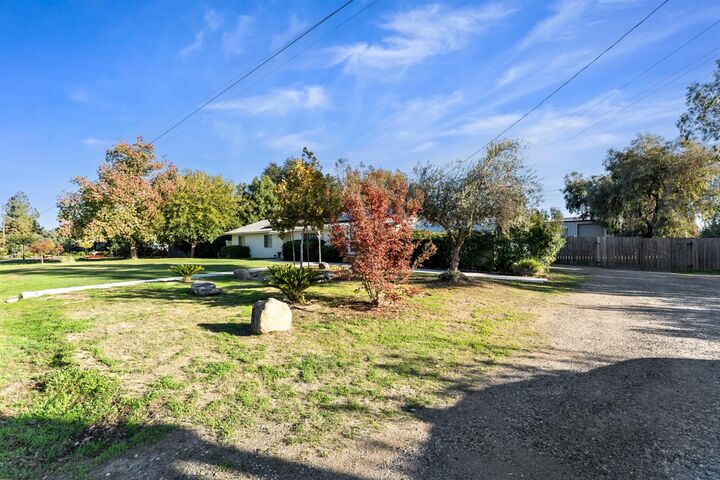 Property Photo: 36740 Kensington Drive CA 93636