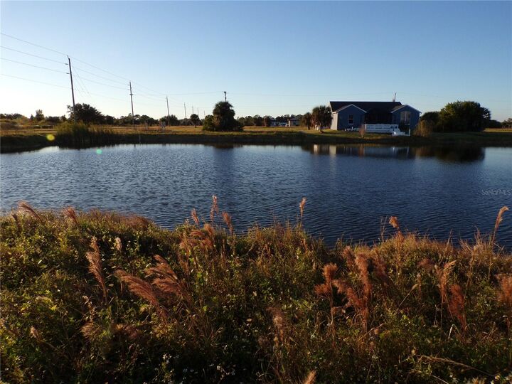 Property Photo: 1 Blue Hen Drive FL 33946