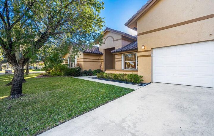 Property Photo:  1200 NW 161st Ave  FL 33028 