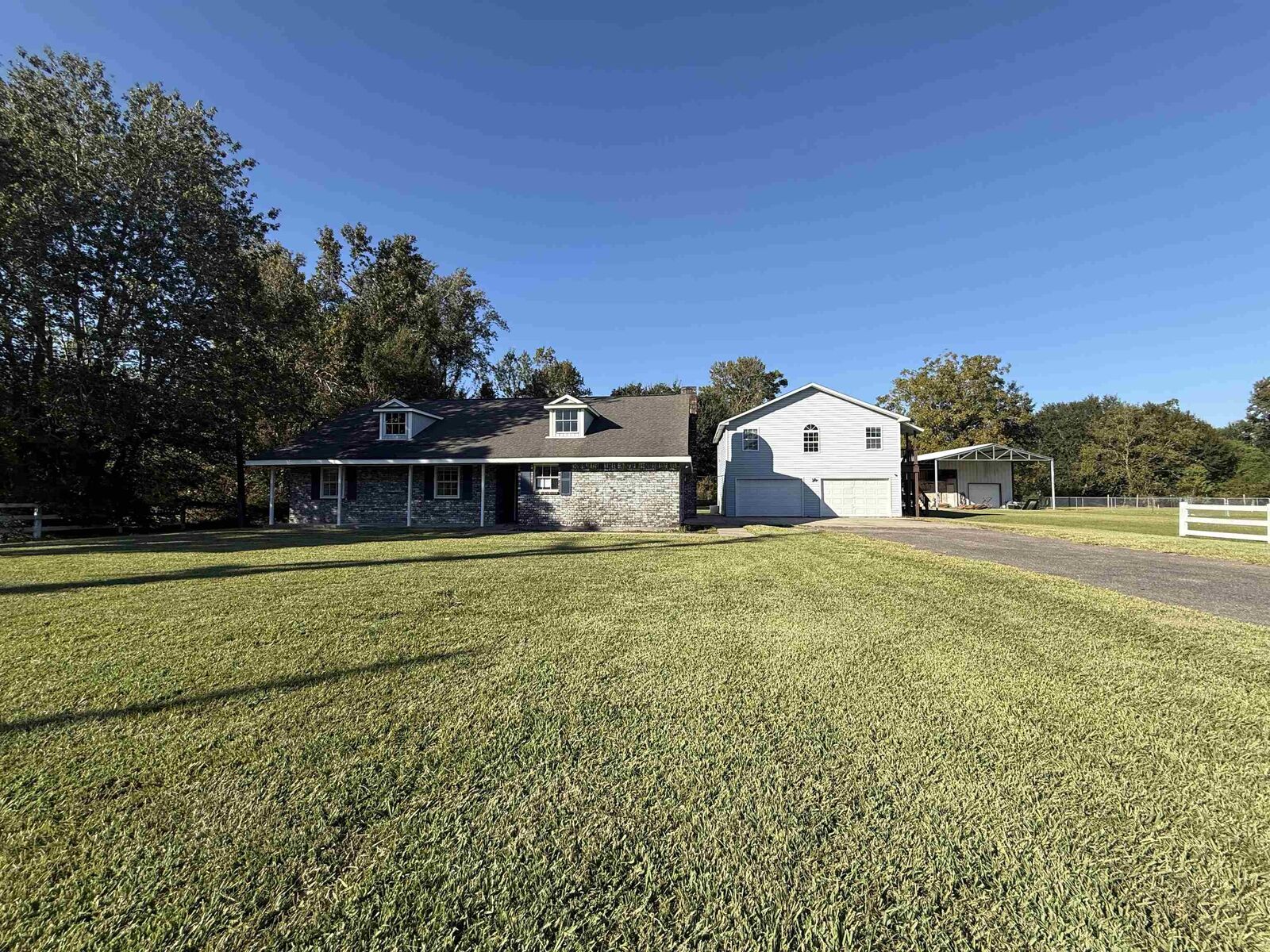 Property Photo:  215 Gilmer  TX 77611 