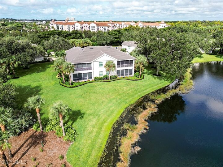 Property Photo:  9111 Palmetto Ridge Drive 201  FL 34135 