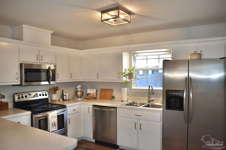 Property Photo:  3300 Meghans Way  FL 32571 