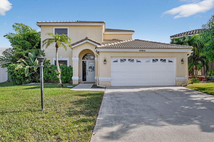 Property Photo: 1984 White Coral Way FL 33414