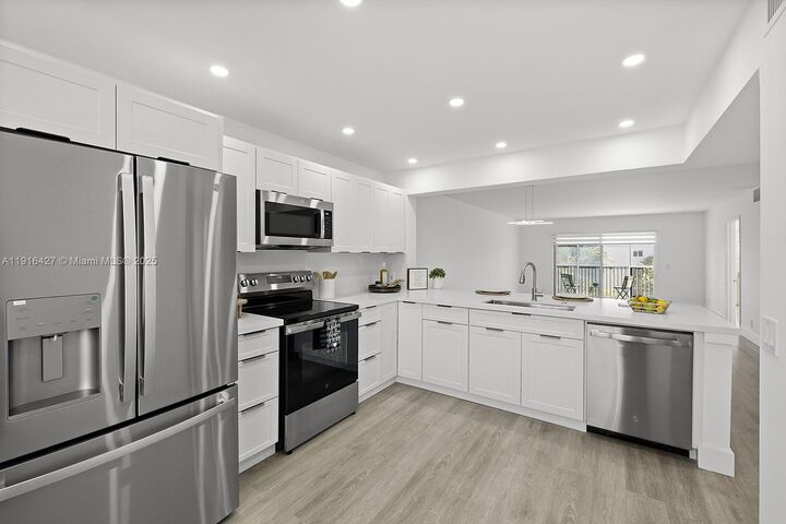 Property Photo:  12500 SW 5th Ct 410M  FL 33027 