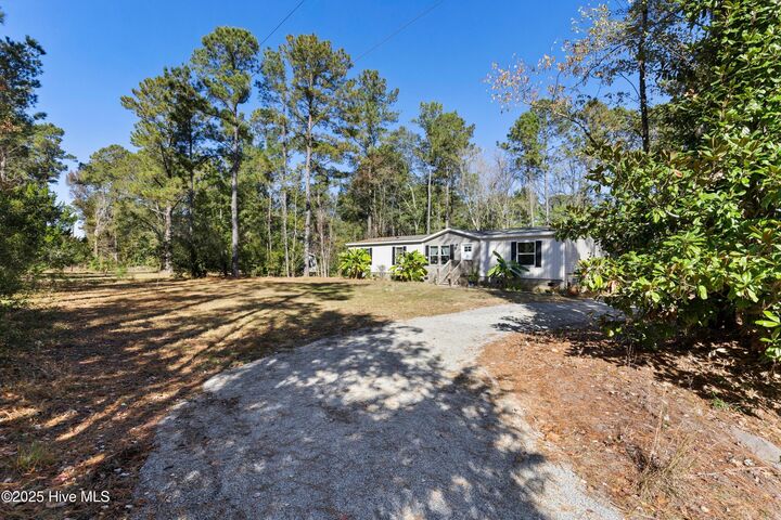 Property Photo:  1480 Maco Road NE  NC 28451 