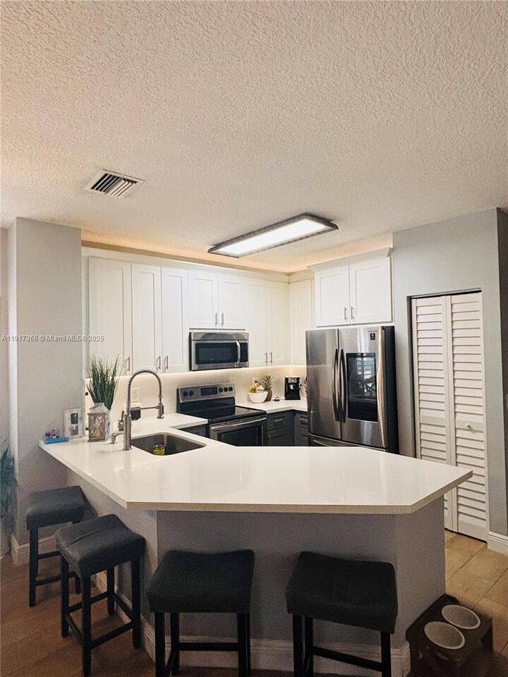 Property Photo:  208 SW 120th Ave  FL 33025 