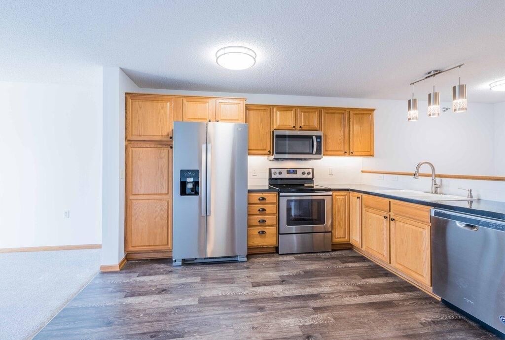 Property Photo:  16154 Main Avenue SE 212  MN 55372 