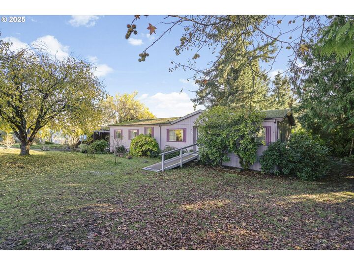 Property Photo:  9160 SW Par Three Dr  OR 97113 