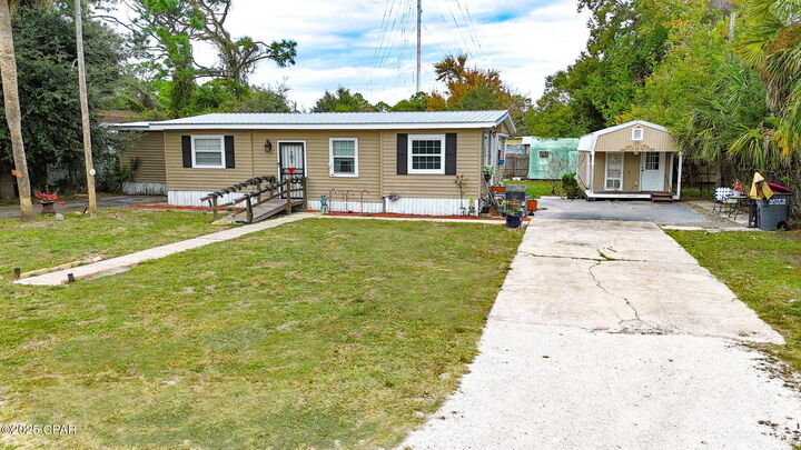 Property Photo:  8610 Lorento Street  FL 32408 